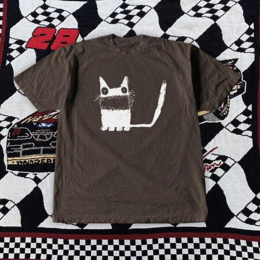 Brown Graphic Cat Tee With A Unique Worn-In Look